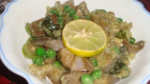 Brinjal and green peas curry